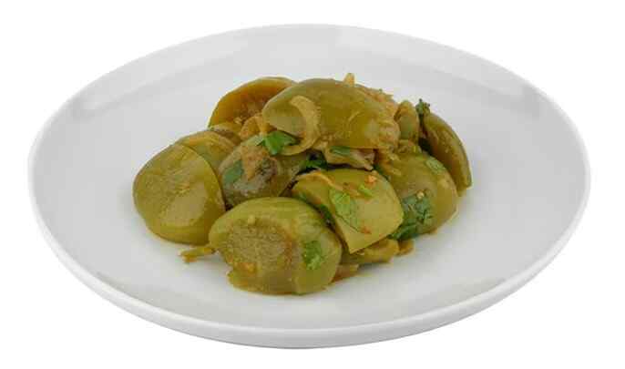 Green tomato salad with spices (homemade)