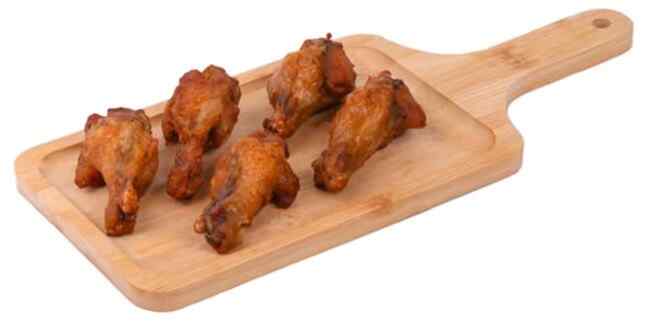 Grilled fried chicken wing in marinade